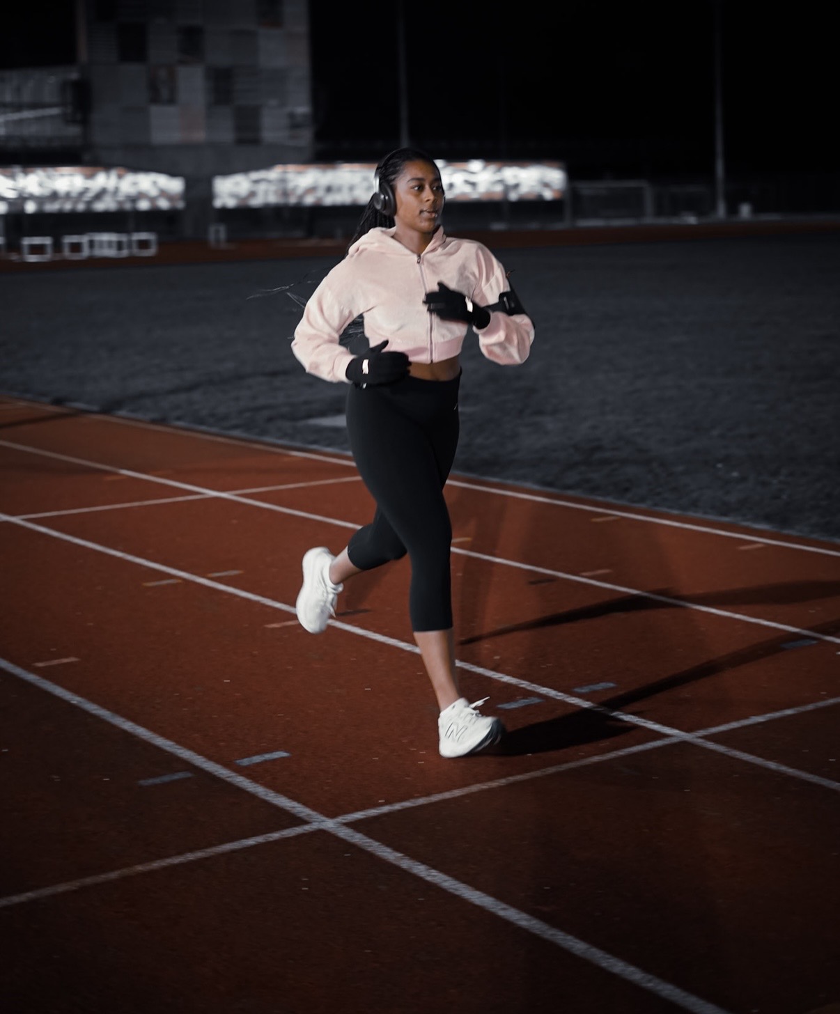 Andrea training on an athletics track